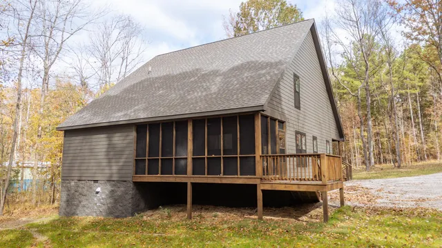 a view of a house with a large window