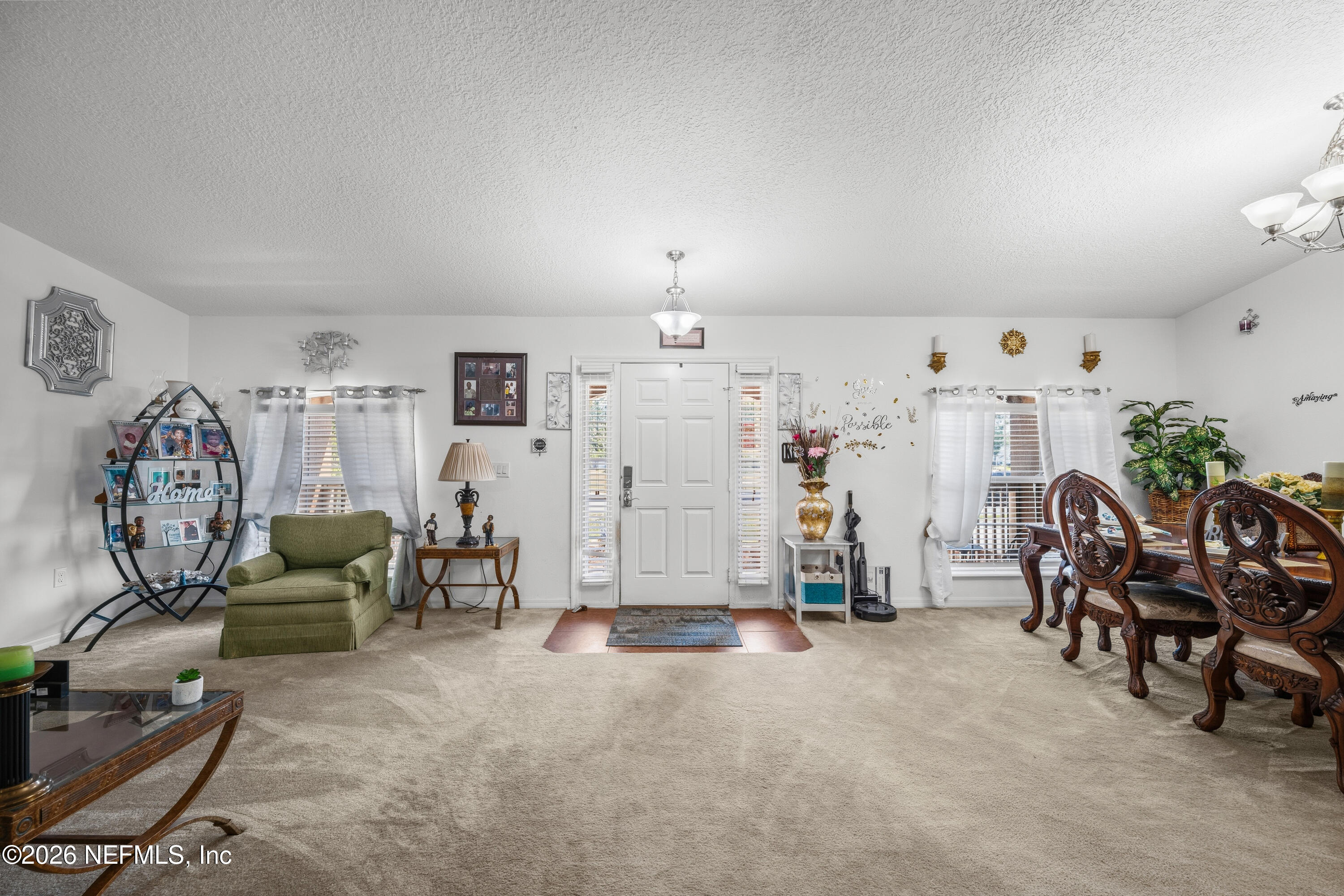 97106 Yorkshire Drive Yulee, FL 32097 - Photo 17 of 53 16 Sitting Room and Dining Room
