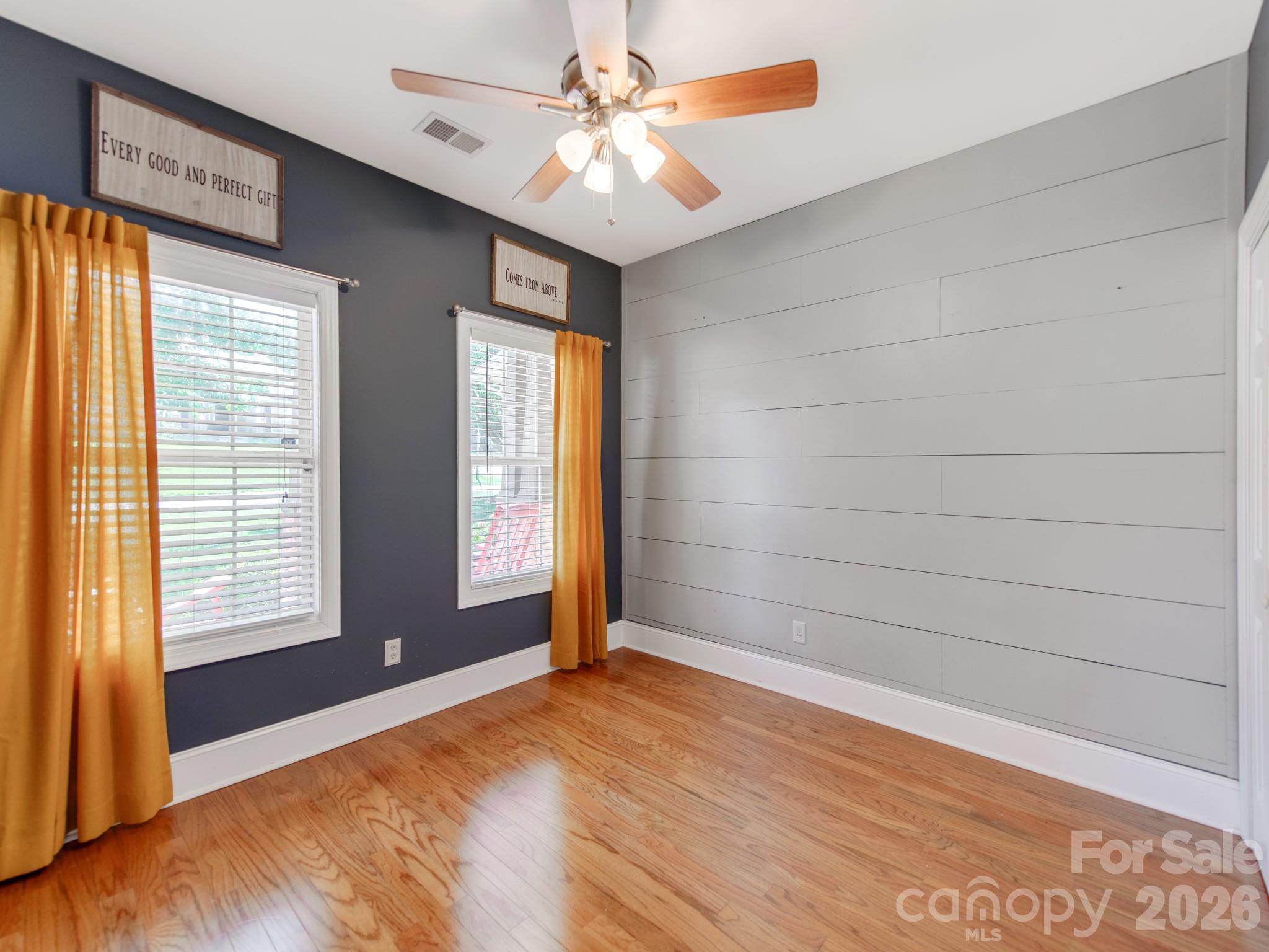 783 Sloan Street Denver, NC 28037 - Photo 24 of 44 a view of an empty room with a window