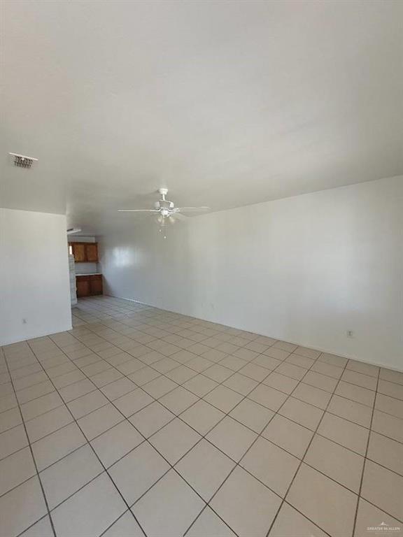 1612 Orange Avenue, Unit 13 Weslaco, TX 78596 - Photo 7 of 12 Unfurnished room featuring ceiling fan