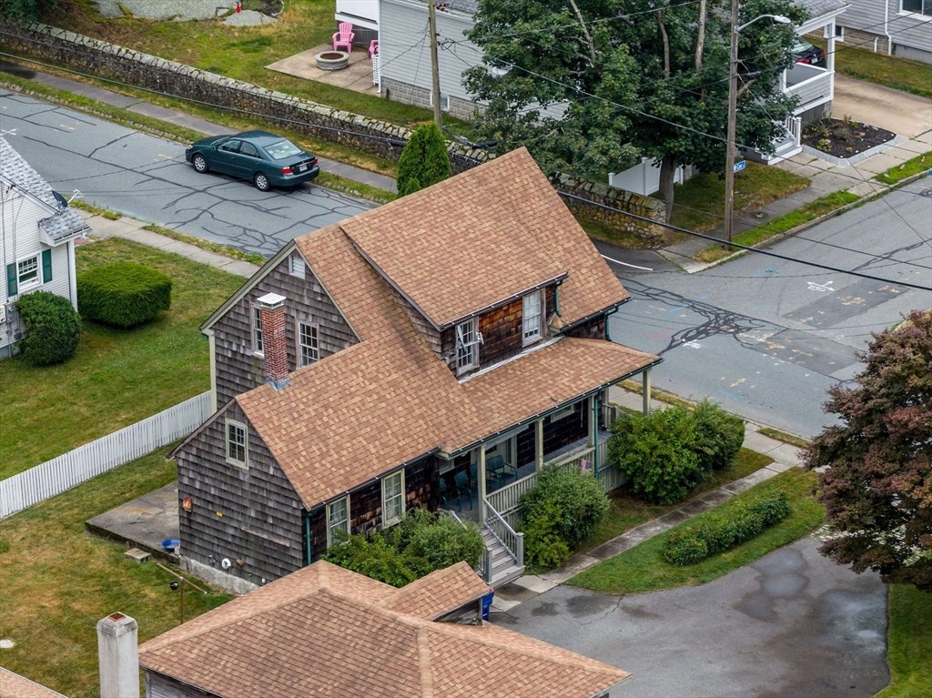 32 Cedar Street Fairhaven, MA 02719 - Photo 3 of 21 a aerial view of a house with a yard