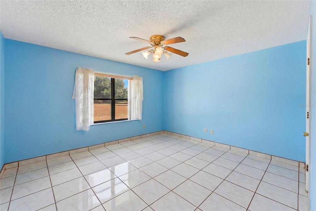 4141 Southwest Sailfish Road Dunnellon, FL 34431 - Photo 22 of 63 a view of an empty room and window
