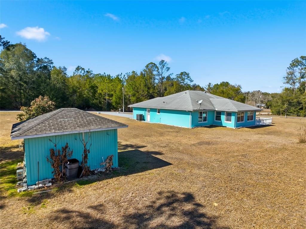 4141 Southwest Sailfish Road Dunnellon, FL 34431 - Photo 55 of 63 a view of a house with roof deck front of house