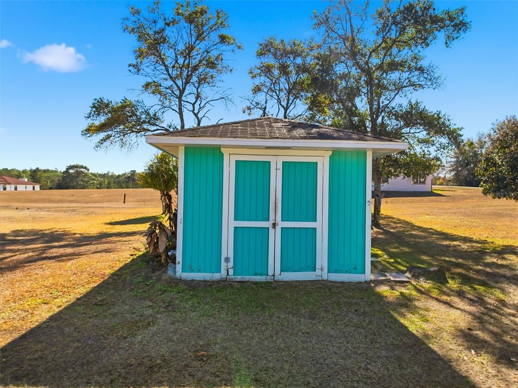 4141 Southwest Sailfish Road Dunnellon, FL 34431 - Photo 56 of 63 a view of a yard with an outdoor space