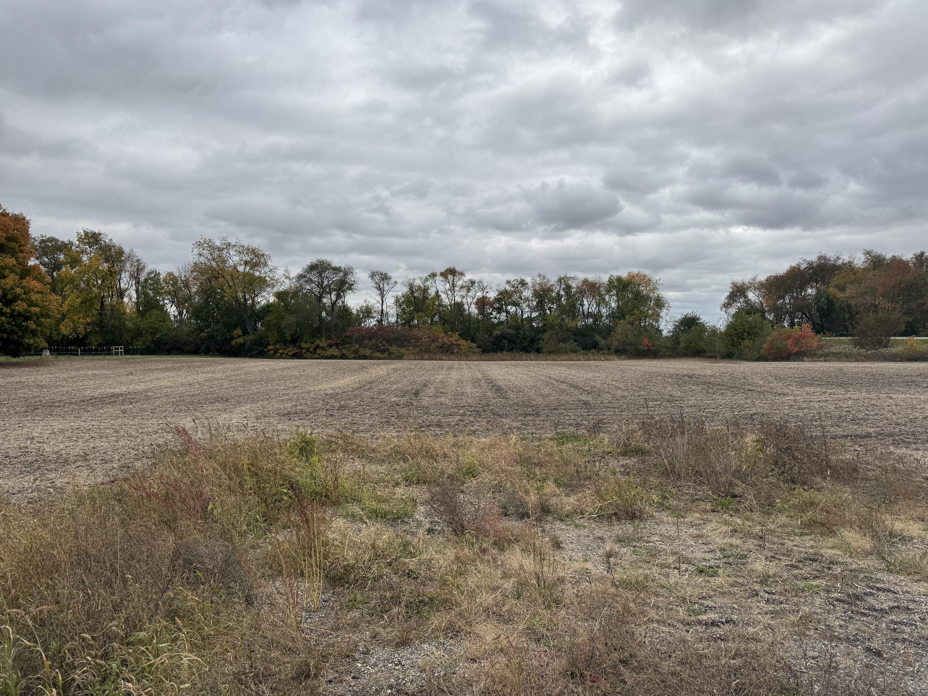 0 West 500 South Road La Porte, IN 46350 - Photo 2 of 2 a view of a field with trees in background