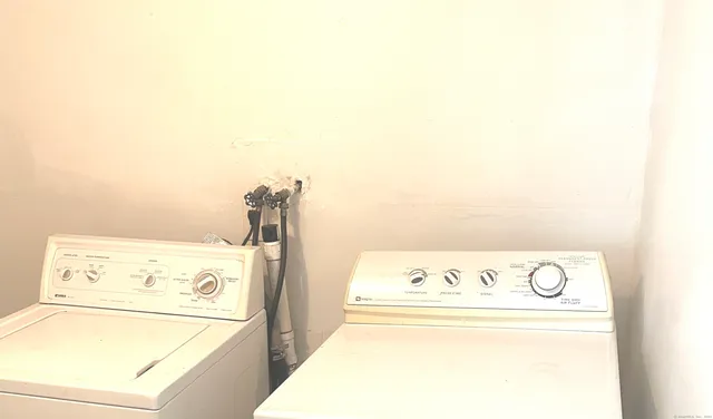 a view of a kitchen with utility and racks