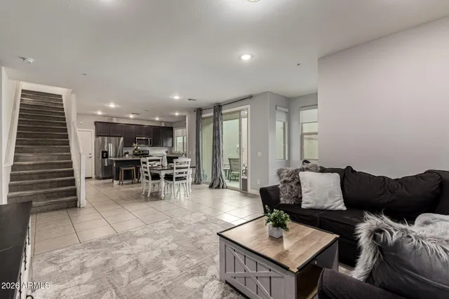 a bathroom with a sink a mirror and a window