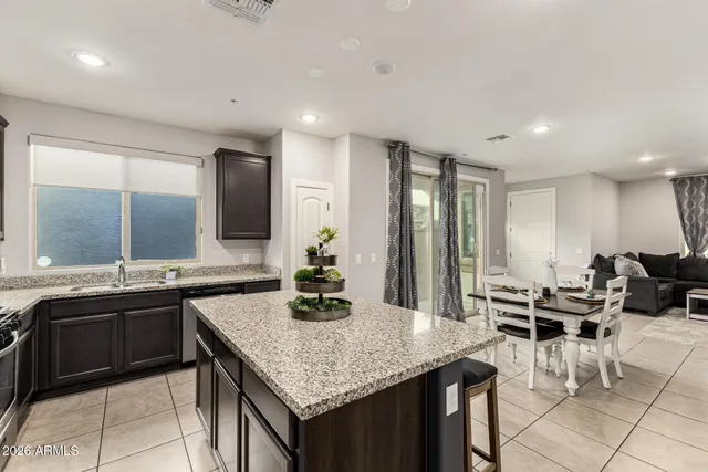 a bedroom with a bed and dresser