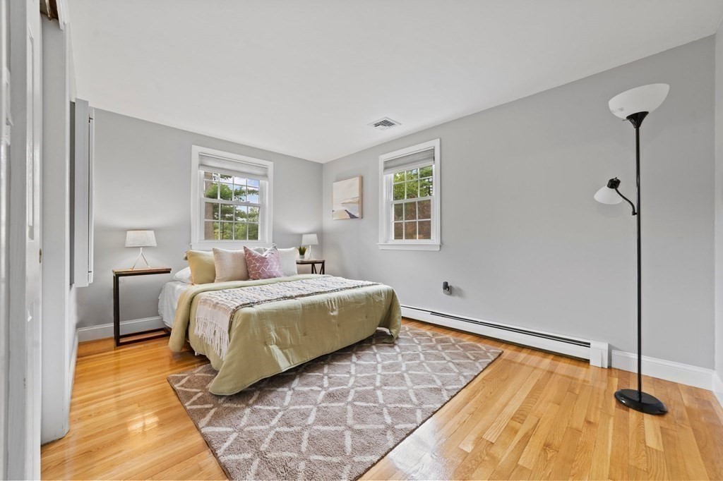 56 Cedarcrest Road Hanover, MA 02339 - Photo 13 of 26 a bedroom with a bed and a window