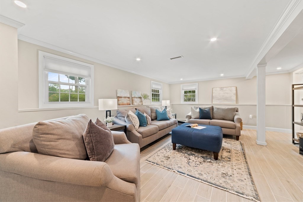 56 Cedarcrest Road Hanover, MA 02339 - Photo 15 of 26 a living room with furniture and a window