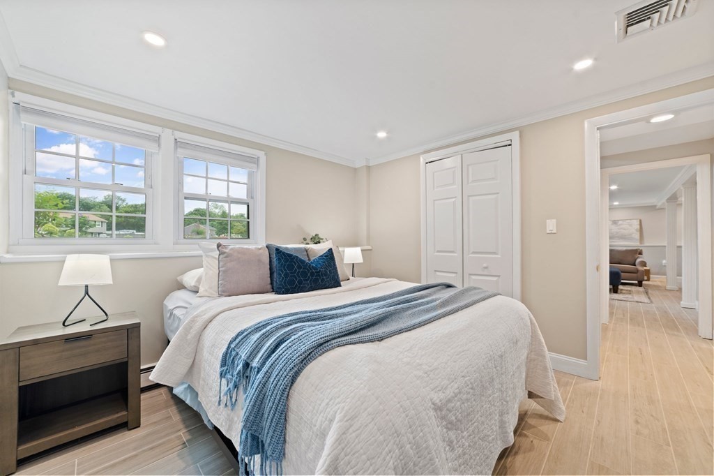 56 Cedarcrest Road Hanover, MA 02339 - Photo 19 of 26 a bedroom with a bed and a window