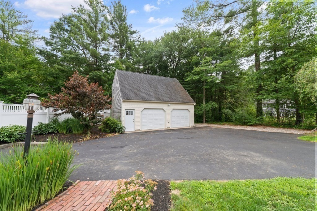 56 Cedarcrest Road Hanover, MA 02339 - Photo 23 of 26 a house with a yard