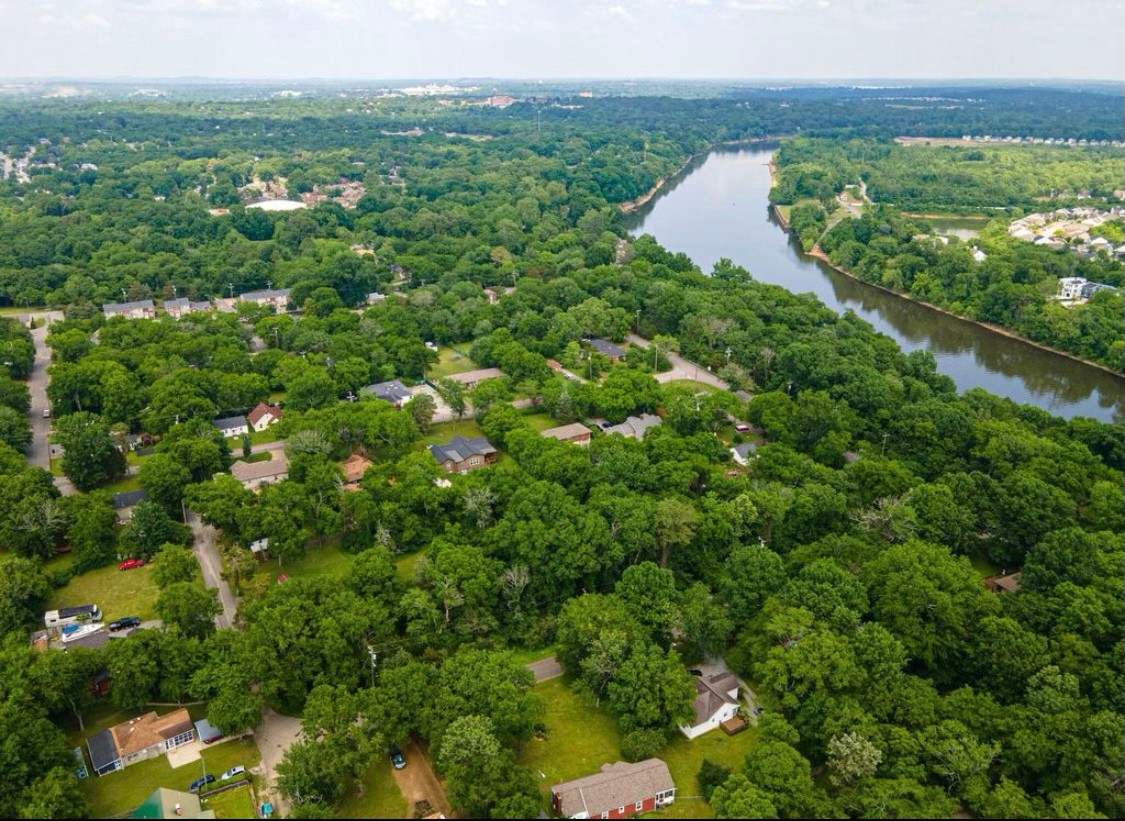 0 Grapevine Avenue Madison, TN 37115 - Photo 8 of 10 a view of a lake with a city