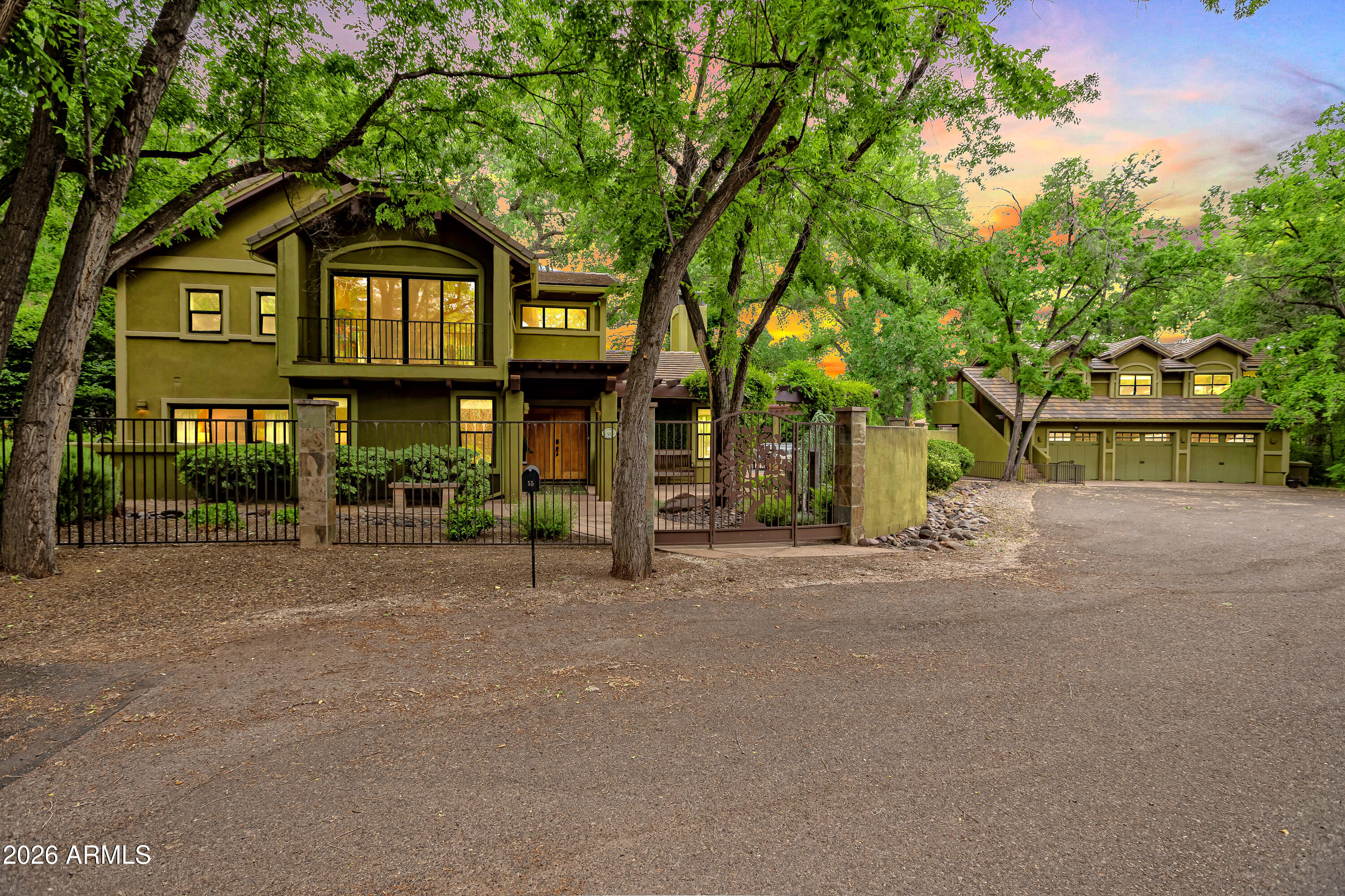 55 Ranch House Circle Sedona, AZ 86336 - Photo 1 of 61 a front view of a building with street view