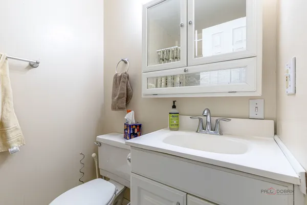 a bathroom with a sink and a toilet