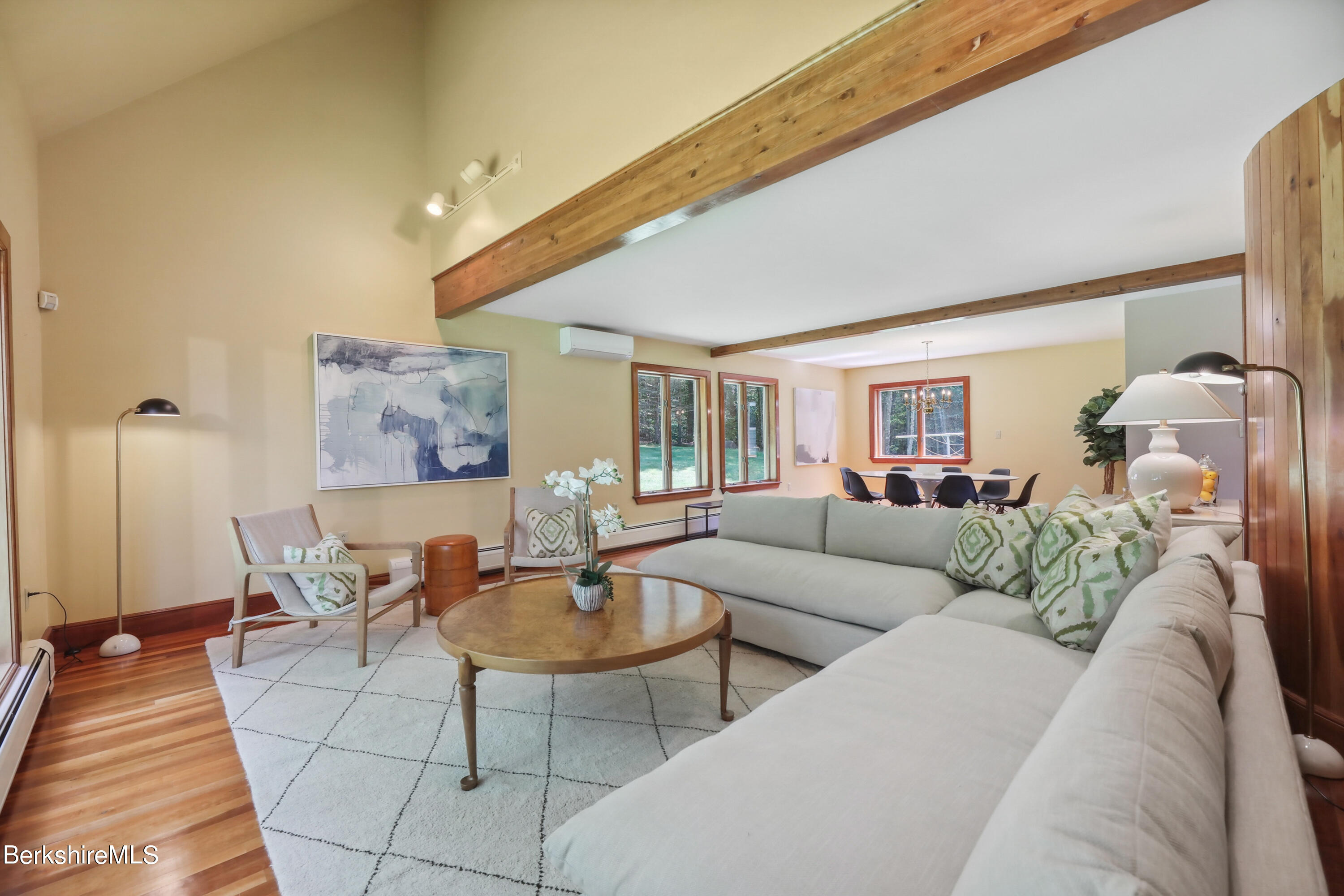 86 George Carter Road Becket, MA 01223 - Photo 13 of 35 a living room with furniture and a wooden floor