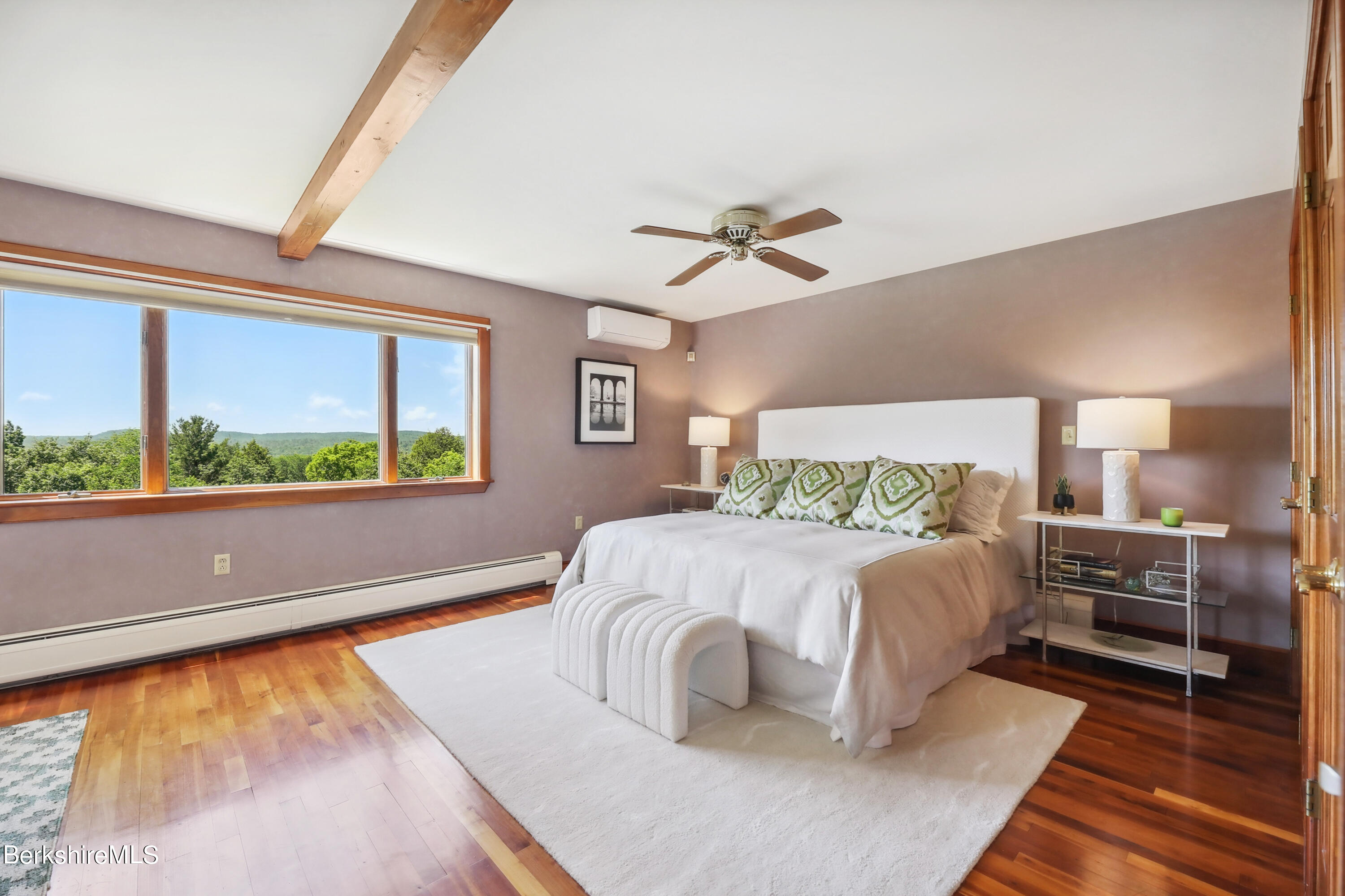 86 George Carter Road Becket, MA 01223 - Photo 16 of 35 a bedroom with a large bed and a window