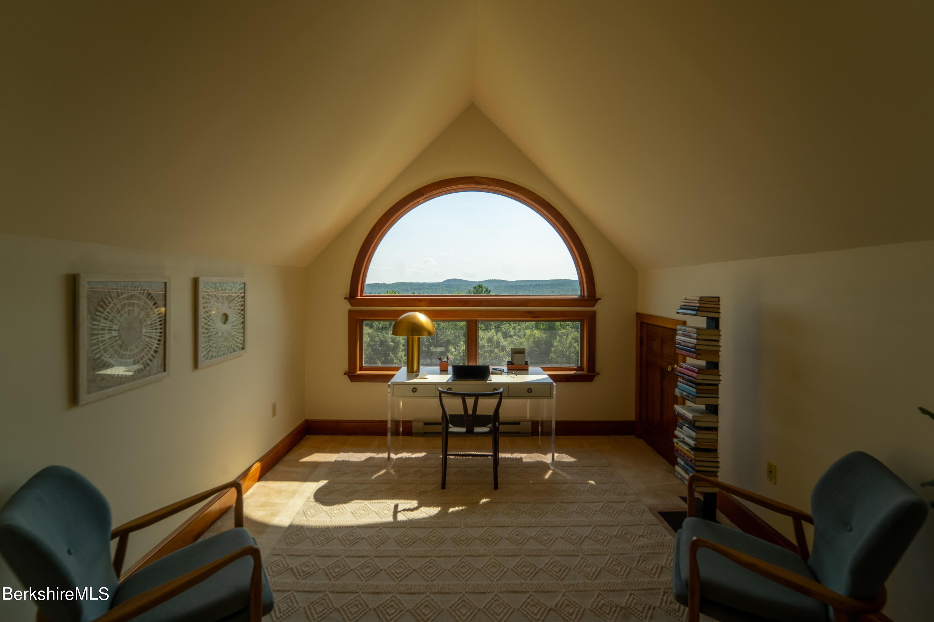 86 George Carter Road Becket, MA 01223 - Photo 26 of 35 a living room with furniture and a large window