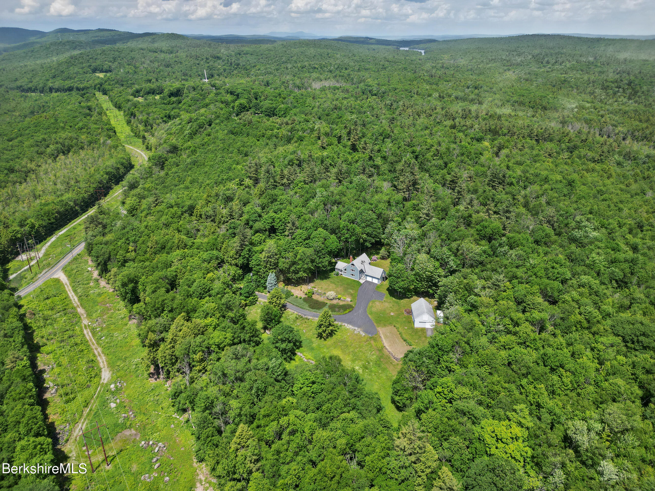 86 George Carter Road Becket, MA 01223 - Photo 35 of 35 a view of a big yard with lots of bushes