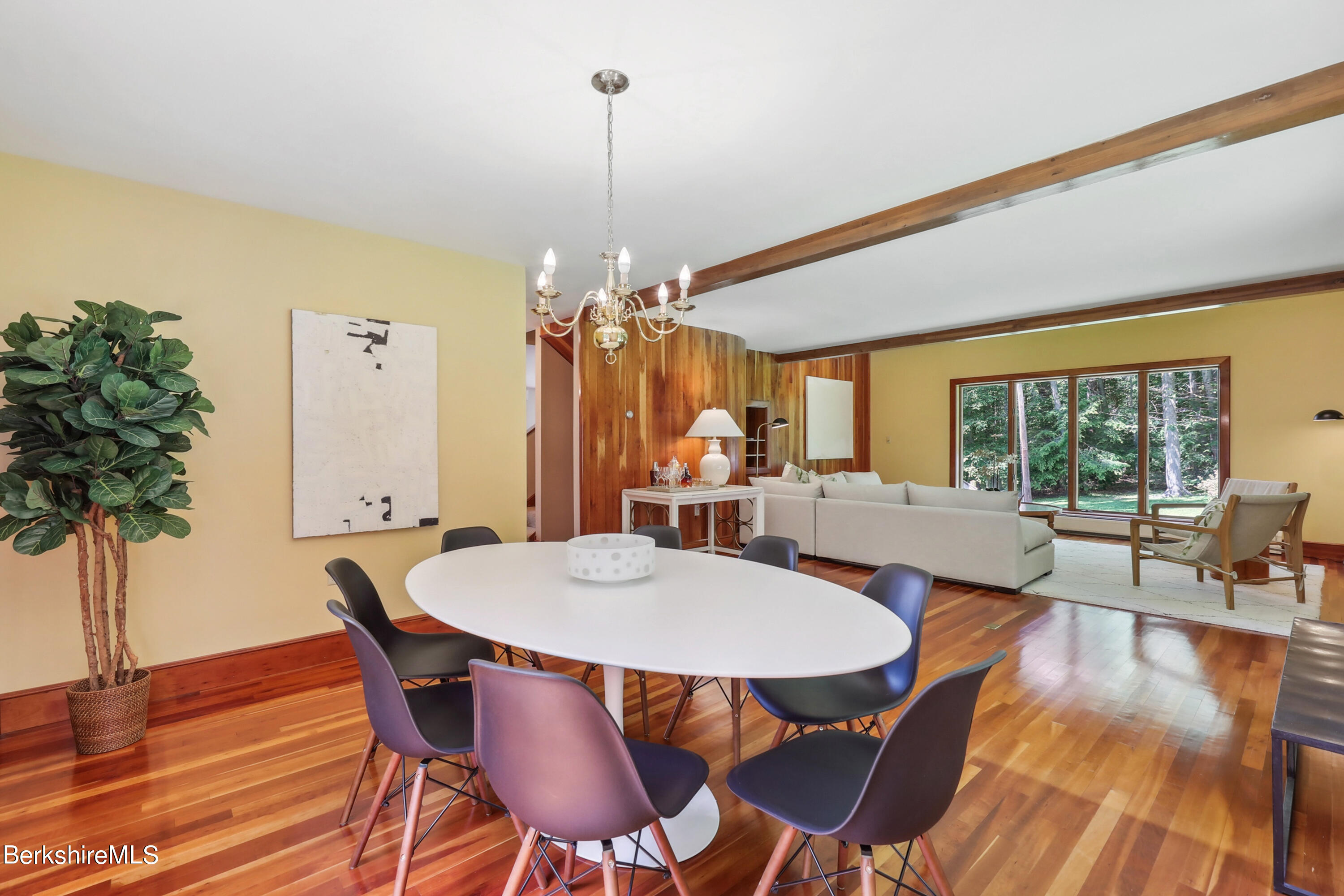 86 George Carter Road Becket, MA 01223 - Photo 10 of 35 a view of a dining room with furniture window and wooden floor