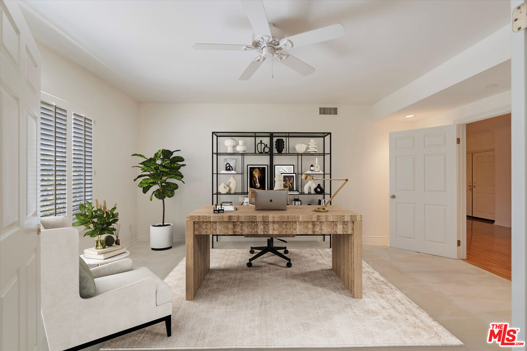 4310 Cahuenga Boulevard, Unit 304 Toluca Lake, CA 91602 - Photo 13 of 35 a work room with furniture and a potted plant