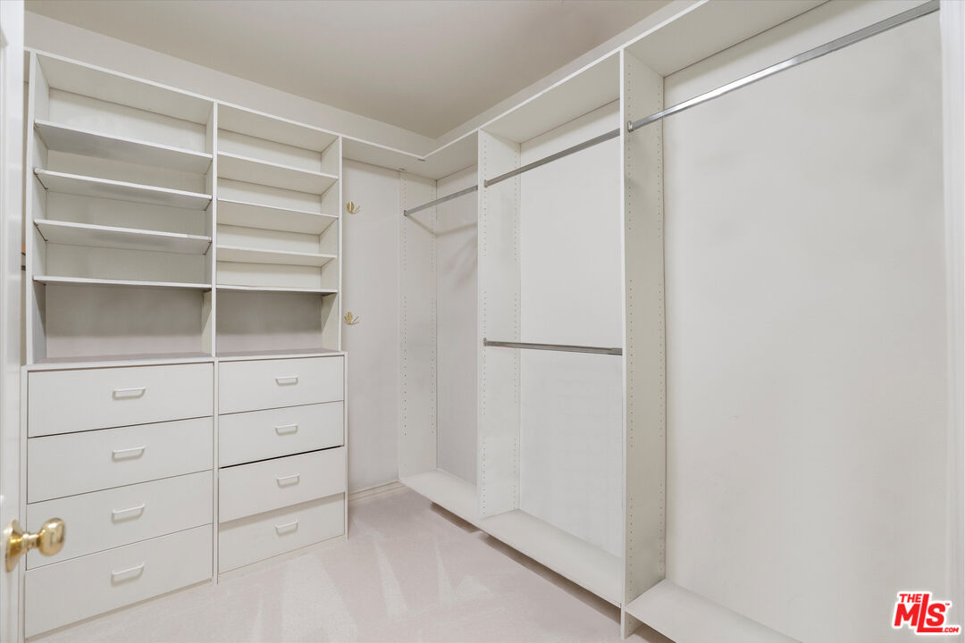 4310 Cahuenga Boulevard, Unit 304 Toluca Lake, CA 91602 - Photo 18 of 35 a view of an empty walk in closet