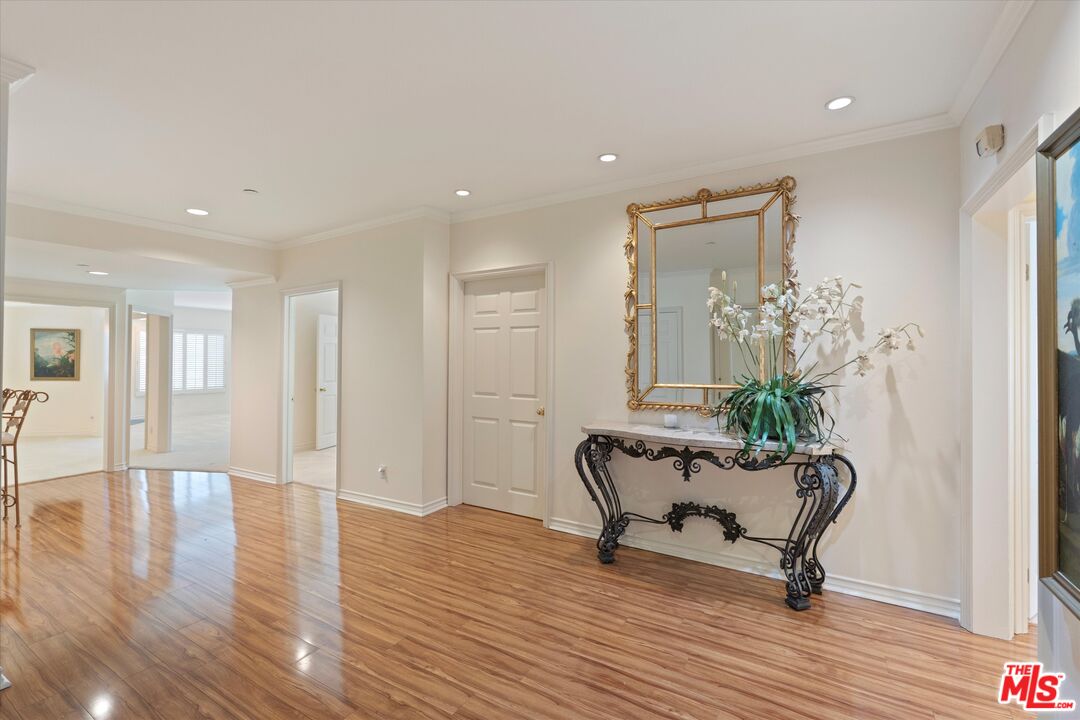 4310 Cahuenga Boulevard, Unit 304 Toluca Lake, CA 91602 - Photo 2 of 35 a view of a livingroom with furniture and a potted plant
