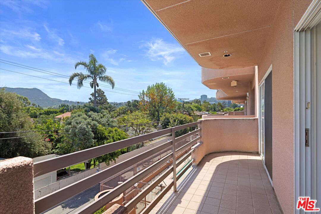 4310 Cahuenga Boulevard, Unit 304 Toluca Lake, CA 91602 - Photo 21 of 35 a view of balcony with furniture