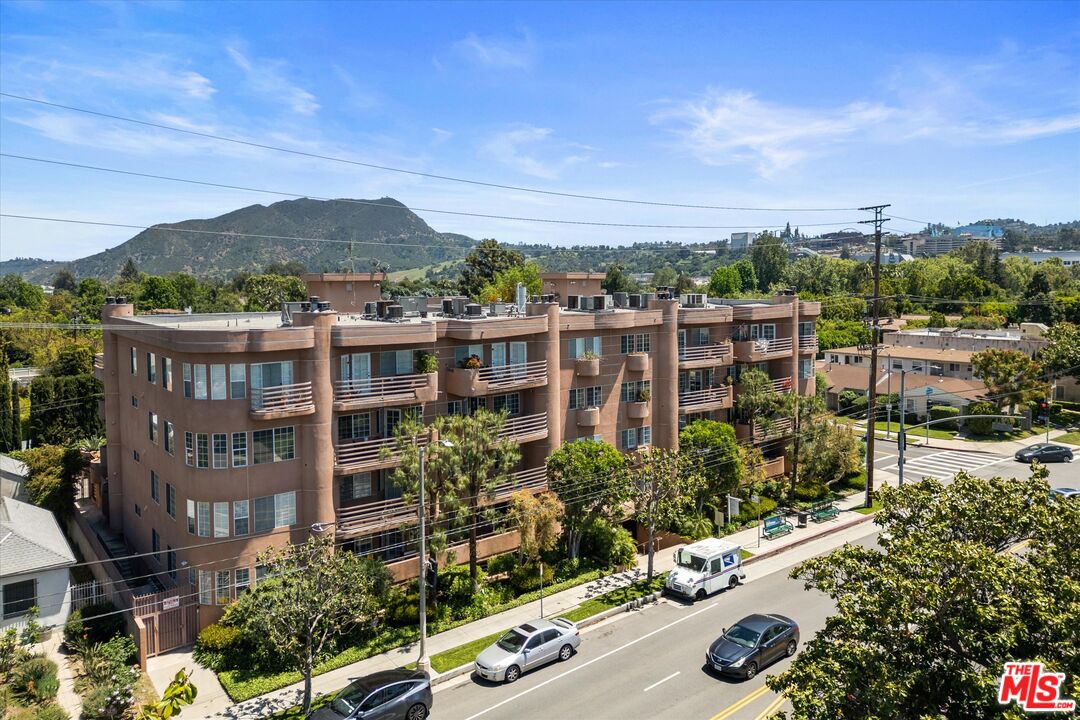4310 Cahuenga Boulevard, Unit 304 Toluca Lake, CA 91602 - Photo 28 of 35 a view of city with tall buildings and a street