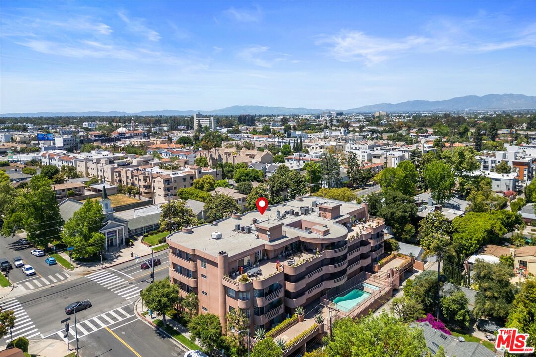 4310 Cahuenga Boulevard, Unit 304 Toluca Lake, CA 91602 - Photo 30 of 35 an aerial view of a house with a garden
