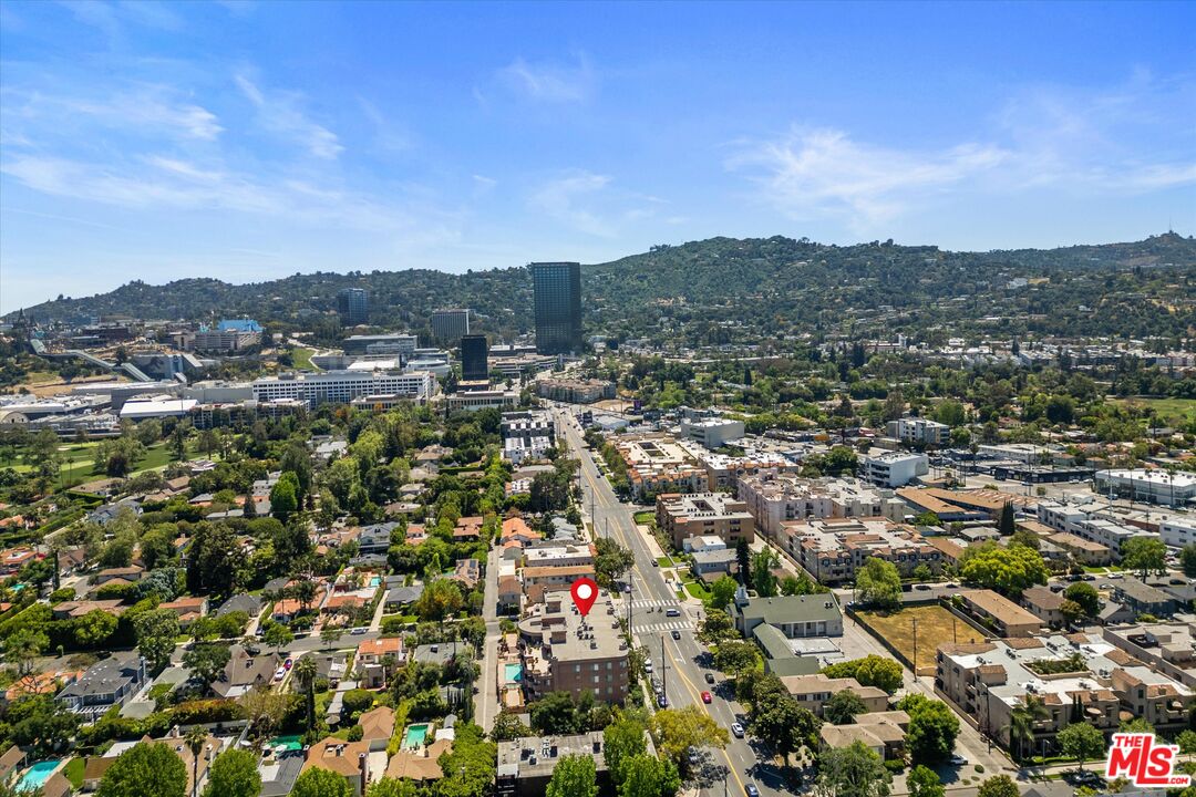 4310 Cahuenga Boulevard, Unit 304 Toluca Lake, CA 91602 - Photo 34 of 35 an aerial view of residential houses with outdoor space and trees