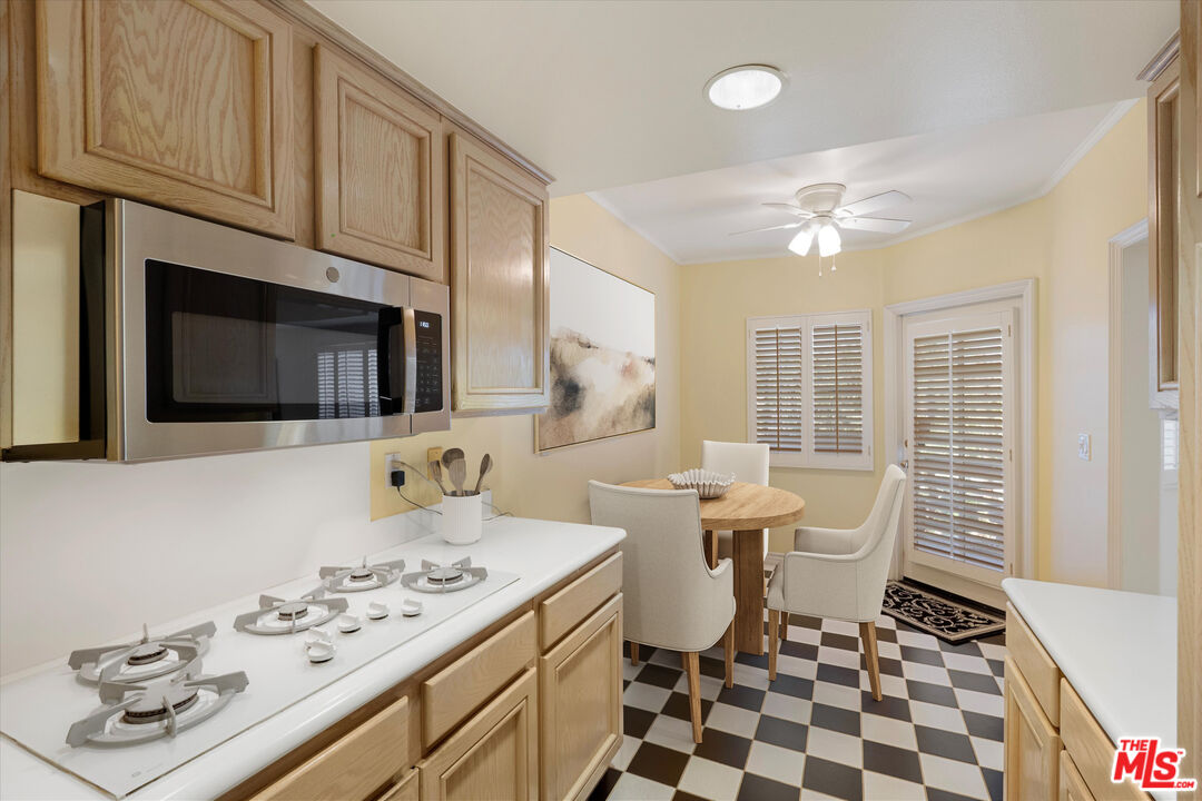 4310 Cahuenga Boulevard, Unit 304 Toluca Lake, CA 91602 - Photo 6 of 35 a bathroom with a sink a toilet and a mirror