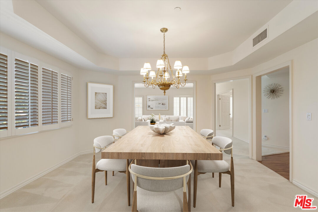 4310 Cahuenga Boulevard, Unit 304 Toluca Lake, CA 91602 - Photo 7 of 35 a view of a dining room with furniture and window