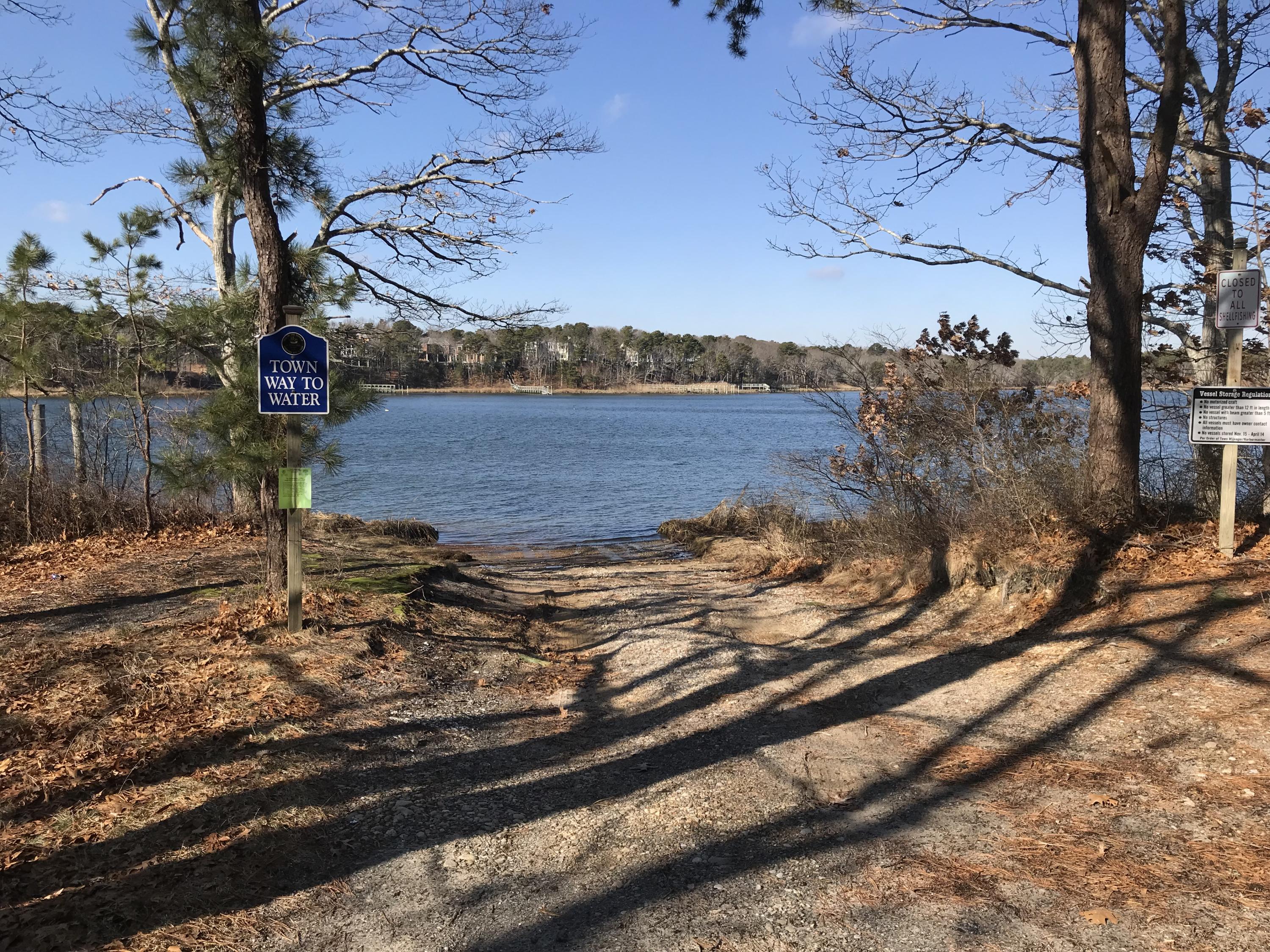 116 Bay Road Cotuit, MA 02635 - Photo 9 of 25 a view of a house with a yard