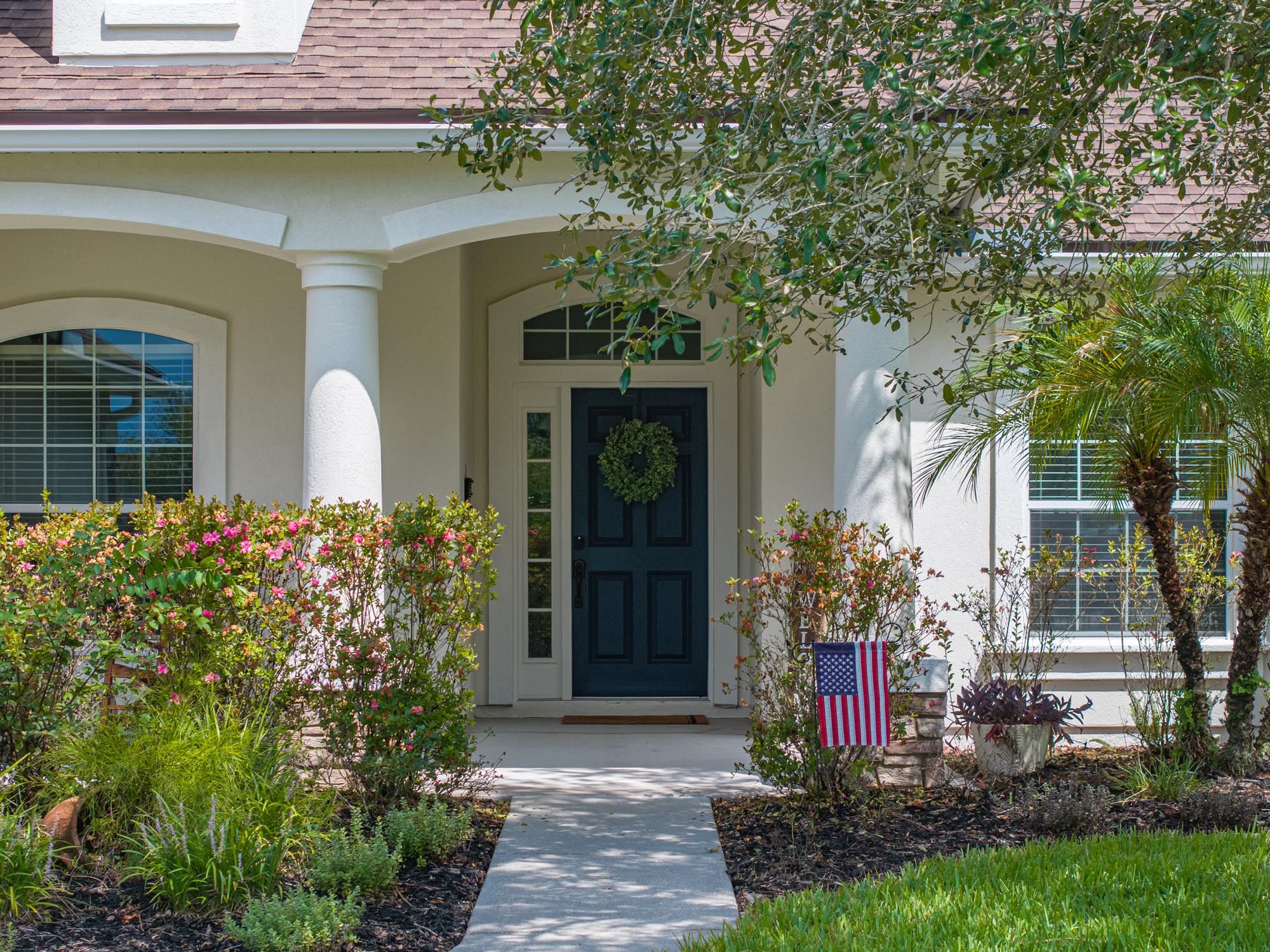 2724 North Portofino Road St. Augustine, FL 32092 - Photo 11 of 86 Entrance to property with stucco siding and a shingled roof