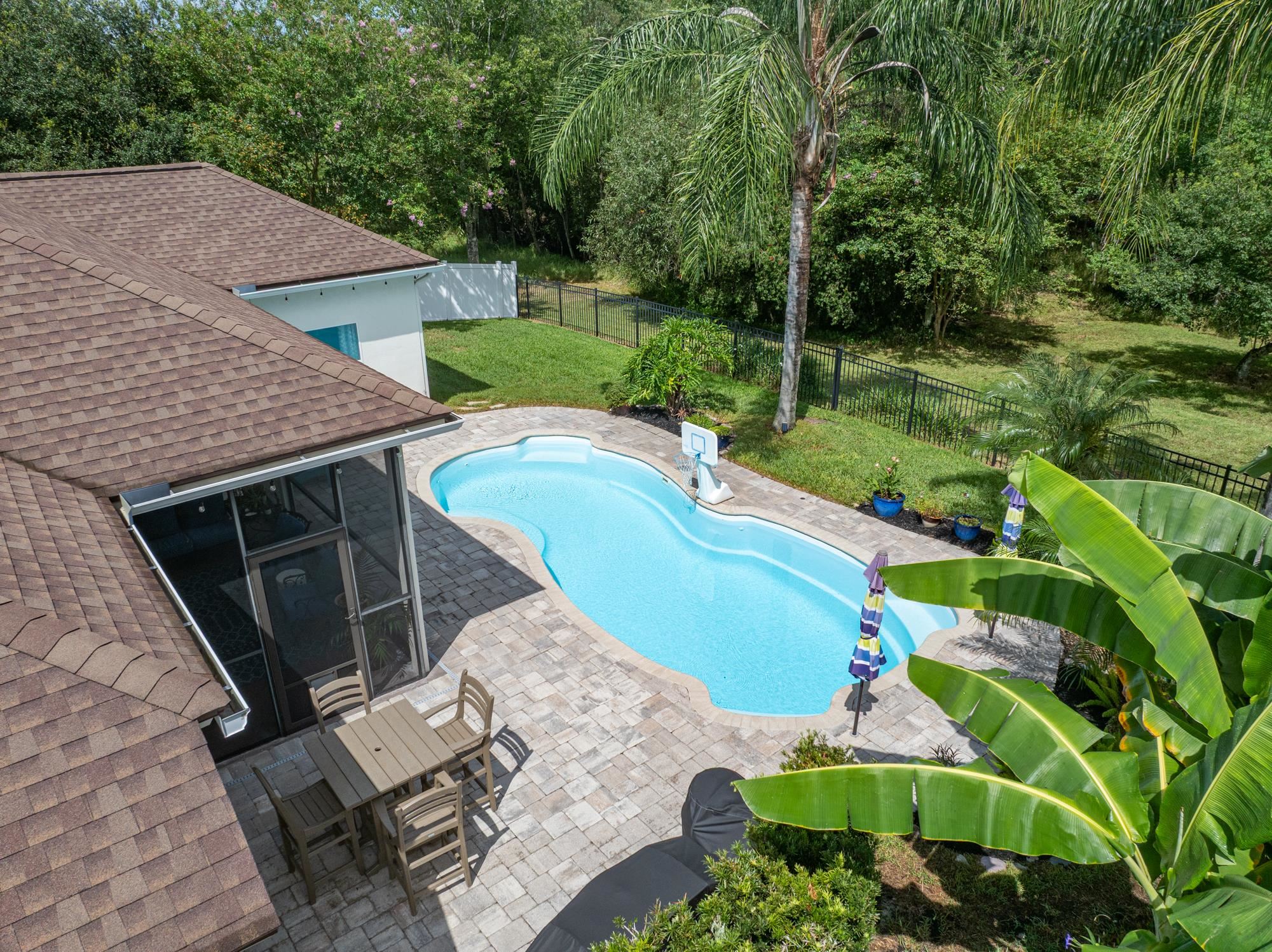 2724 North Portofino Road St. Augustine, FL 32092 - Photo 64 of 86 View of swimming pool featuring a fenced backyard and a patio
