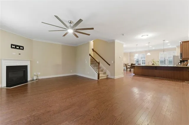 a view of an empty room with a fireplace