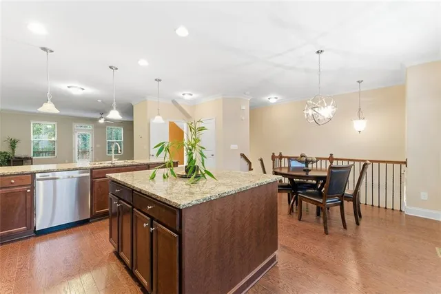 a kitchen with a table and chairs in it