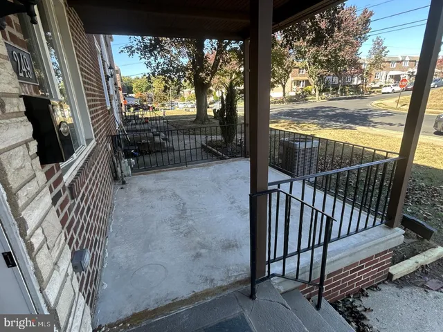 a view of balcony and yard