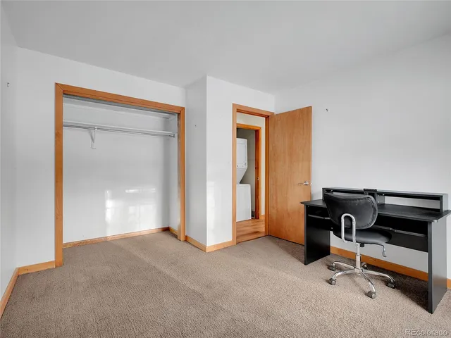 a view of workspace with livingroom