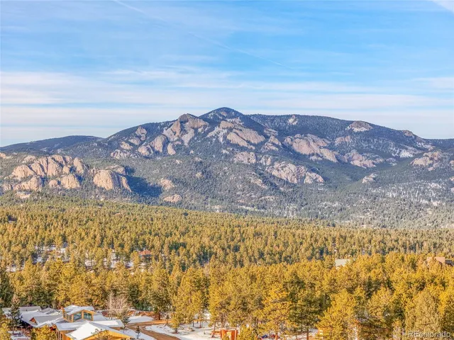 a view of city and mountain