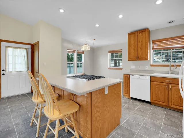 a kitchen that has a cabinets counter space and appliances