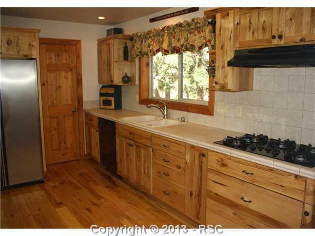198 Joshua Road Divide, CO 80814 - Photo 12 of 25 Gas Range Top and Walk-in Pantry