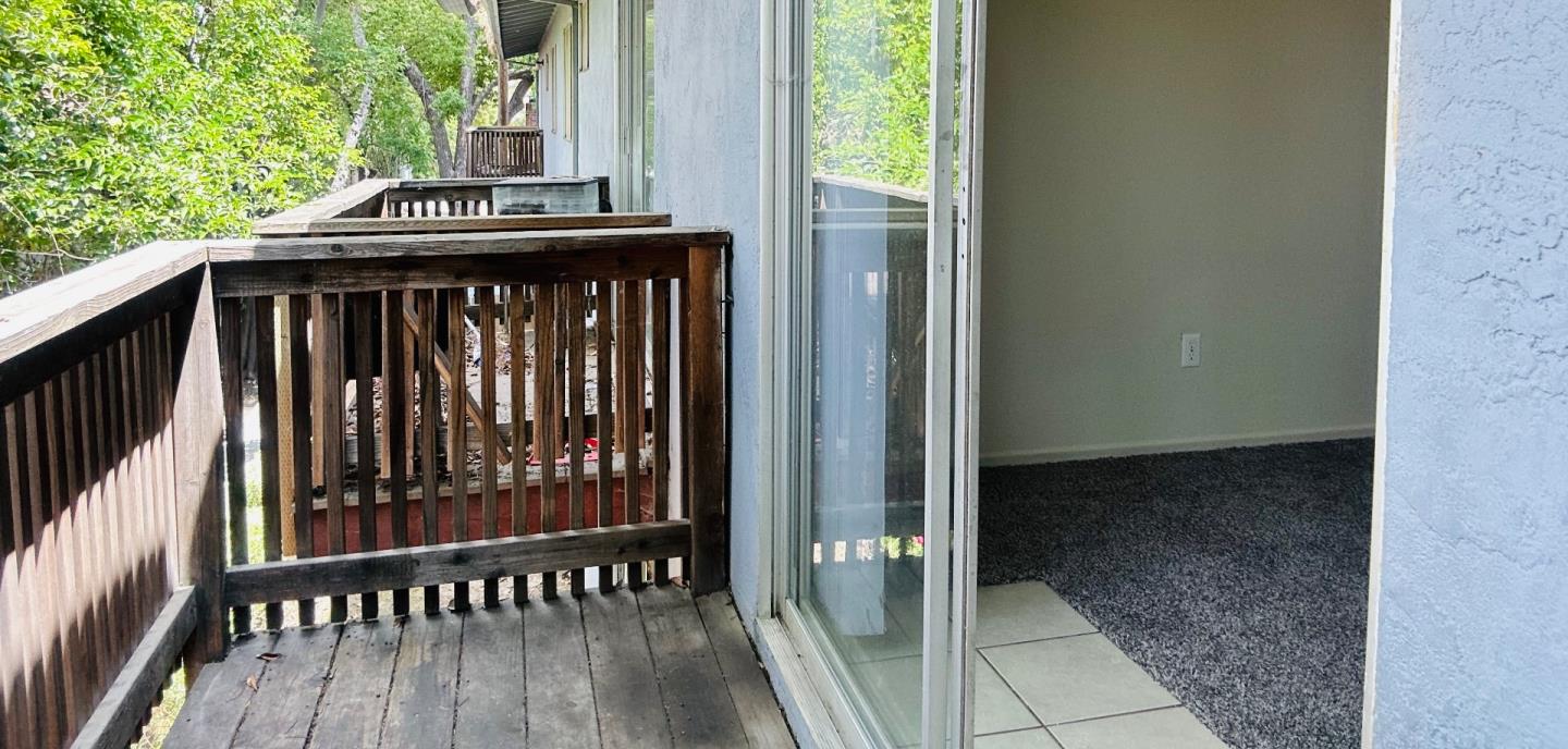 1707 West Swain Road, Unit 10 Stockton, CA 95207 - Photo 12 of 18 a view of wooden deck