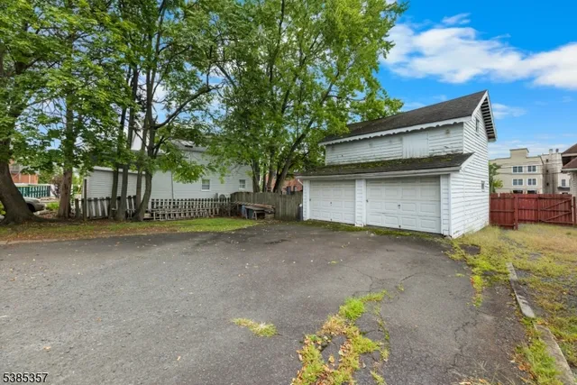 a view of a house with a street