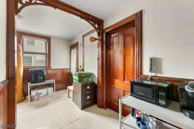 a view of a livingroom with furniture and windows