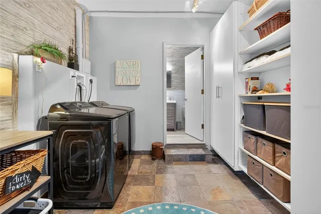 a bathroom with a sink double vanity and a mirror