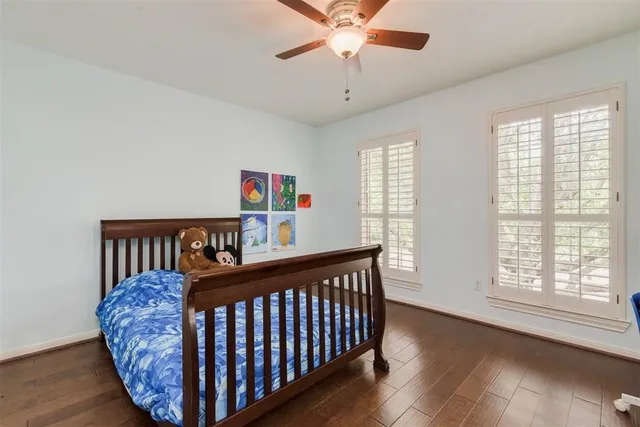 a bedroom with furniture and a window