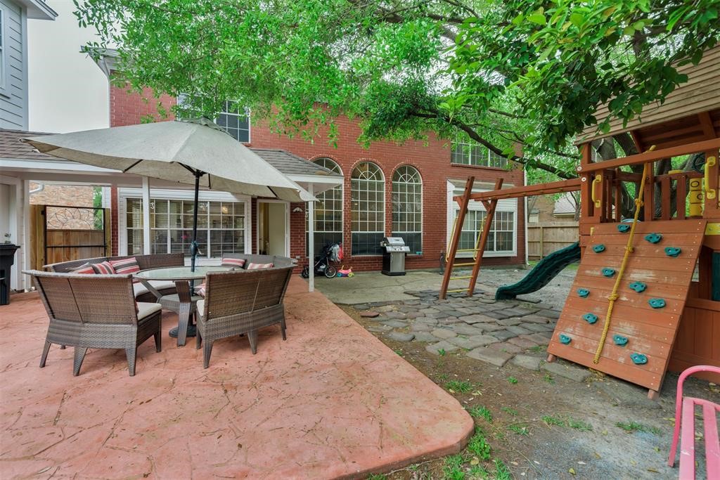 14103 Heatherhill Place Houston, TX 77077 - Photo 39 of 47 an outdoor space with seating