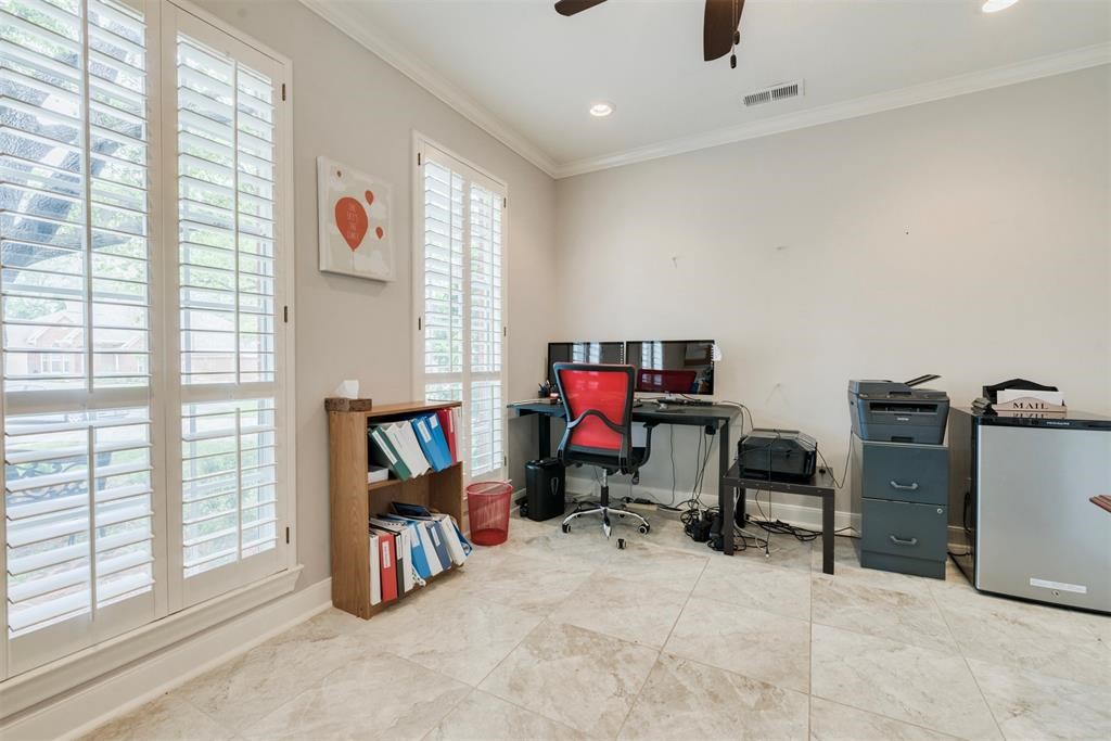 14103 Heatherhill Place Houston, TX 77077 - Photo 7 of 47 a view of a workspace with furniture and a window